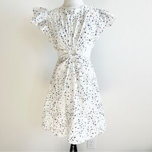 Chic Backless White Dress with Blue Floral Design